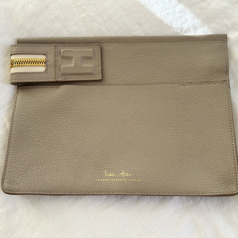 Chic Leather Clutch with gold accents..